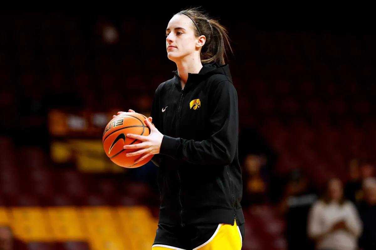 Caitlin Clark (22) of the Iowa Hawkeyes looks on prior to the start of the game against the Minnesota Golden Gophers in Minneapolis on Feb. 28, 2024. (David Berding/Getty Images)