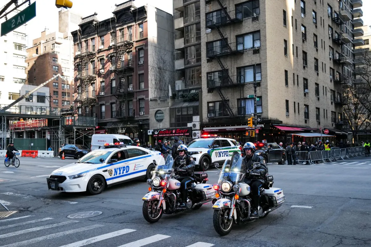 New York City Police Department (NYPD) officers patrol on motorcycles ahead of the arrival of President Joe Biden's motorcade in New York on Feb. 26, 2024. (Charly Triballeau/AFP via Getty Images)