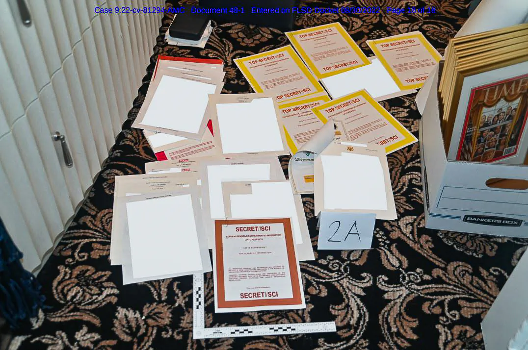 Documents seized during the Aug. 8 raid by the FBI of former President Donald Trump's Mar-a-Lago estate in Palm Beach, Fla., in a photo released on Aug. 30, 2022. (FBI via The Epoch Times)