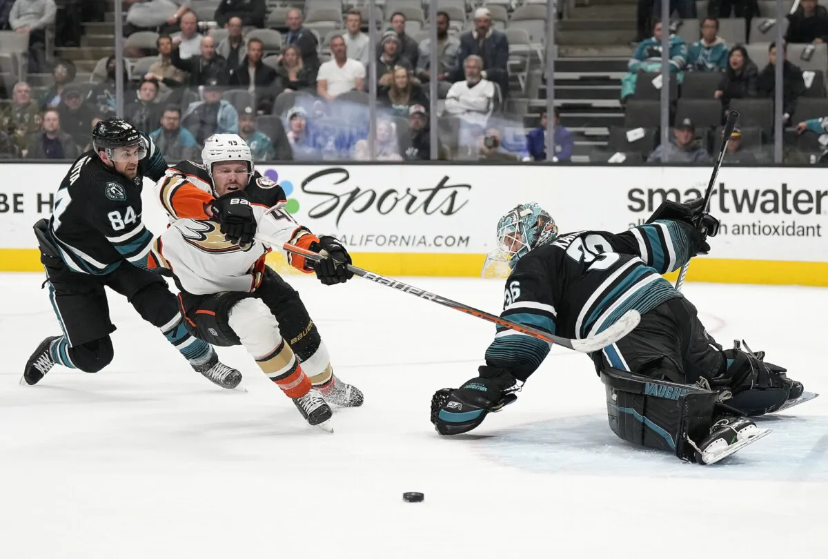 Goalie Kaapo Kahkonen (36) of the San Jose Sharks defends his goal deflecting the shot from Max Jones (49) of the Anaheim Ducks in the third period at SAP Center in San Jose, Calif., on Feb. 29, 2024. (Thearon W. Henderson/Getty Images)