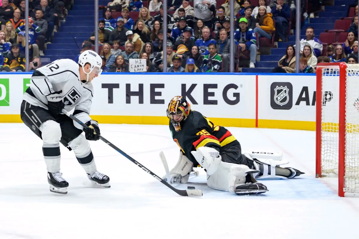 Trevor Moore (12) of the Los Angeles Kings scores a goal on Thatcher Demko (35) of the Vancouver Canucks during the third period of their NHL game at Rogers Arena in Vancouver on Feb. 29, 2024. (Derek Cain/Getty Images)