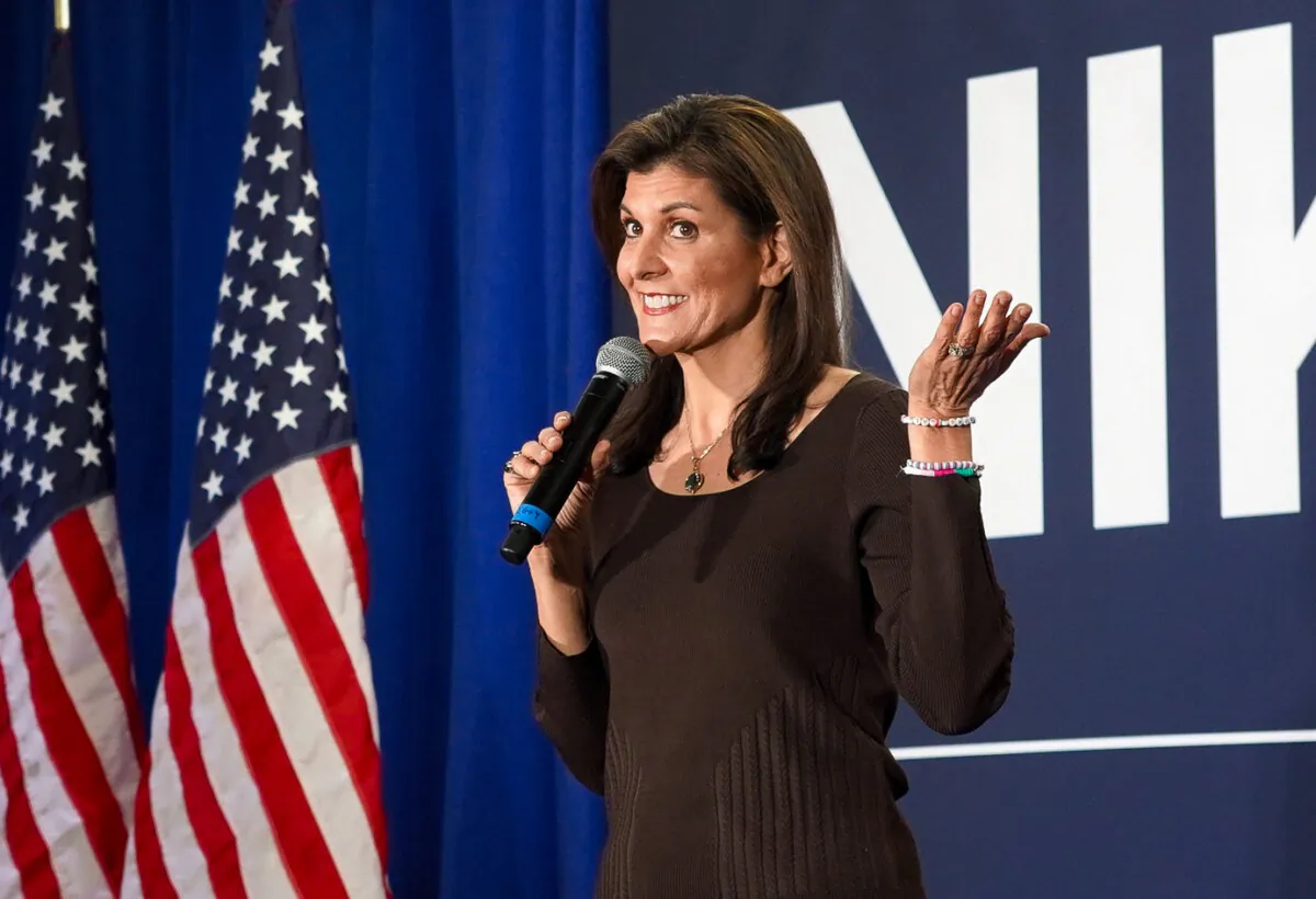 Republican presidential candidate Nikki Haley reacts to protestors at a campaign event in Falls Church, Va., on Feb. 29, 2024. (Terri Wu/The Epoch Times)