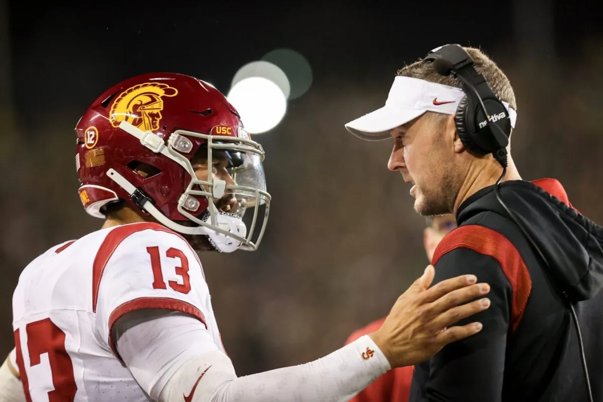 USC Trojans quarterback Caleb Williams talks with USC Trojans head coach Lincoln Riley during the first half of the game against No. 6 Oregon Ducks in Eugene, Ore., on Nov. 11, 2023. (Abigail Dollins/USA TODAY via Field Level Media)