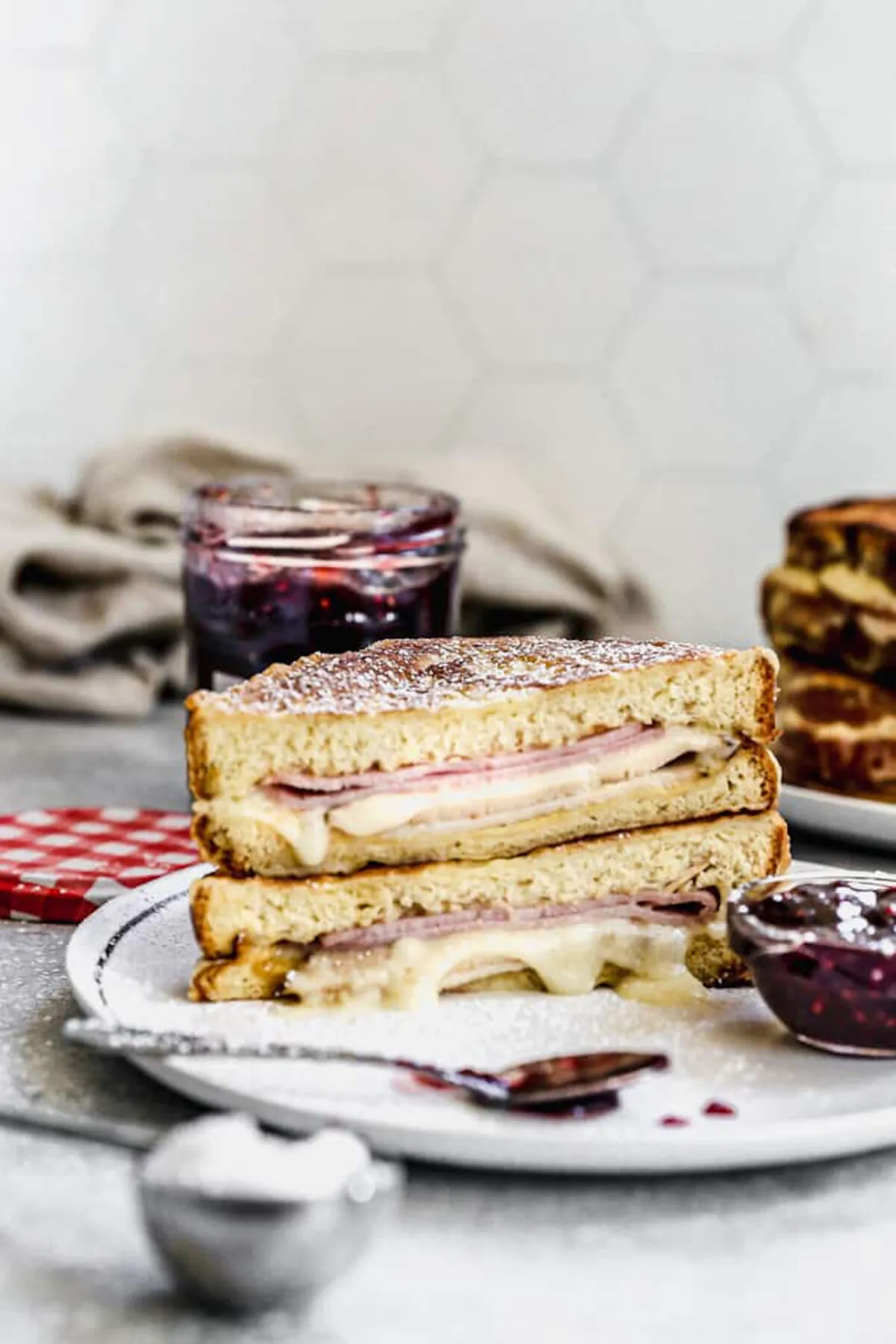 This delicious Monte Cristo Sandwich combines sweet and savory, with ham, turkey and Swiss cheese sandwiched with a touch of dijon, battered and cooked until crispy. Serve it with a dusting of powdered sugar and a side of raspberry jam. (Courtesy of Lauren Allen)