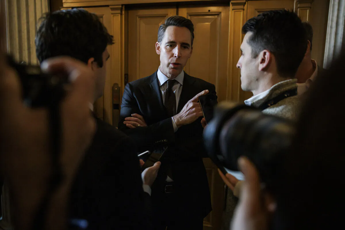 U.S. Sen. Josh Hawley (R-Mo.) talks to reporters as he heads to the Senate floor for a vote in Washington, on Jan. 23, 2024. (Samuel Corum/Getty Images)