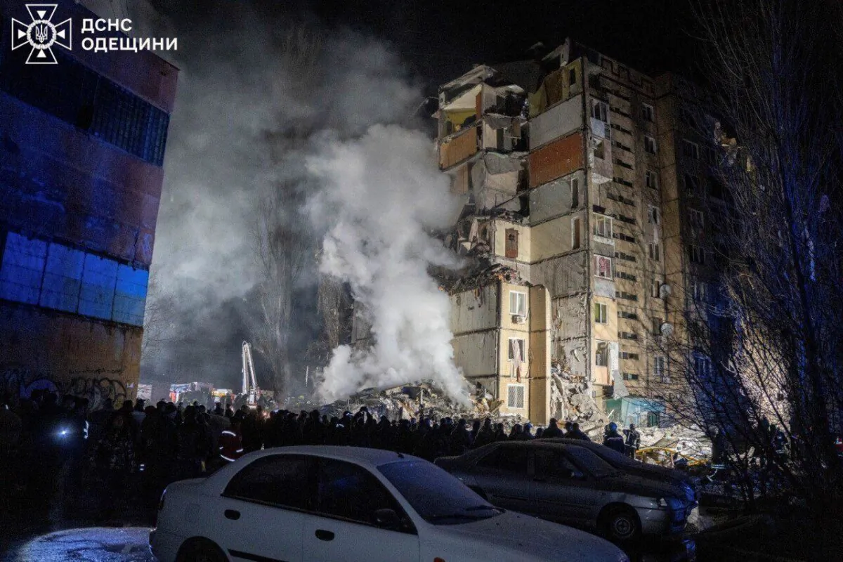 Emergency workers clear the rubble on the site of a destroyed multi-store building after a Russian attack in Odesa, Ukraine, on March 2, 2024. (Ukrainian Emergency Service Office via AP)