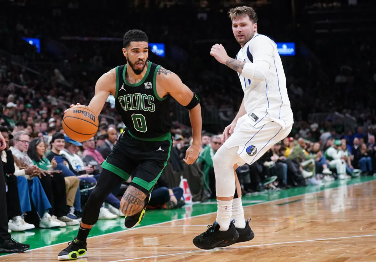 Boston Celtics forward Jayson Tatum (0) drives the ball against Dallas Mavericks guard Luka Doncic (77) during the second half of an NBA game in Boston on Mar. 1, 2024. (David Butler II/USA TODAY Sports via Field Level Media)