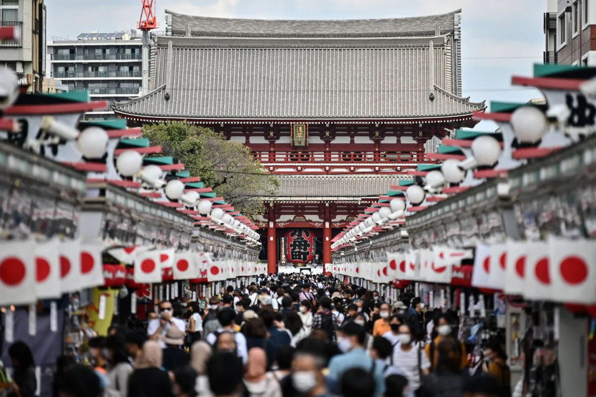 People visit Sensoji temple in Tokyo's Asakusa district on Sept. 22, 2020. (Charly Triballeau/ AFP via Getty Images)