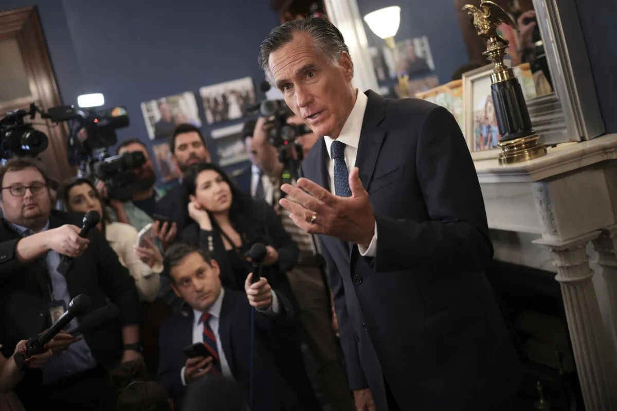 Sen. Mitt Romney (R-Utah) answers questions in his office in Washington, on Sept. 13, 2023. (Win McNamee/Getty Images)