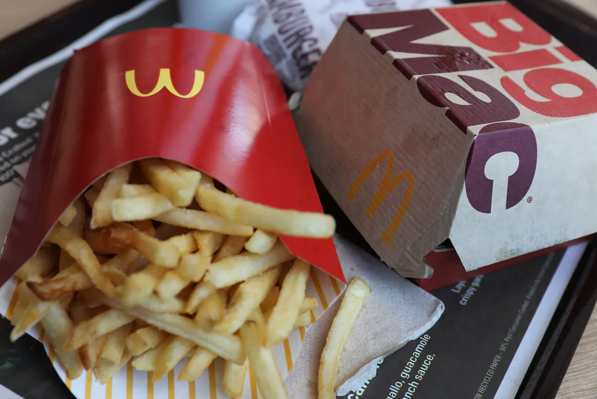 In this photo illustration, a McDonald's Big Mac, double hamburger and french fries are seen on a tray on April 30, 2018 in Miami, Florida. (Joe Raedle/Getty Images/TNS)