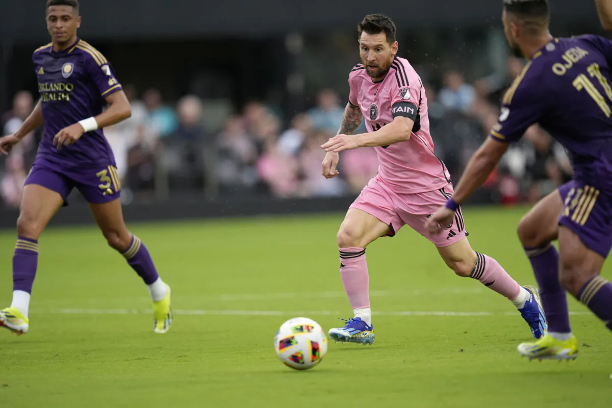 Inter Miami forward Lionel Messi (10) dribbles the ball under pressure from Orlando City midfielder Martín Ojeda (11) and Orlando City defender Rafael Santos (3) during the first half of an MLS soccer match in Fort Lauderdale, Fla., on March 2, 2024. (Rebecca Blackwell/AP Photo)