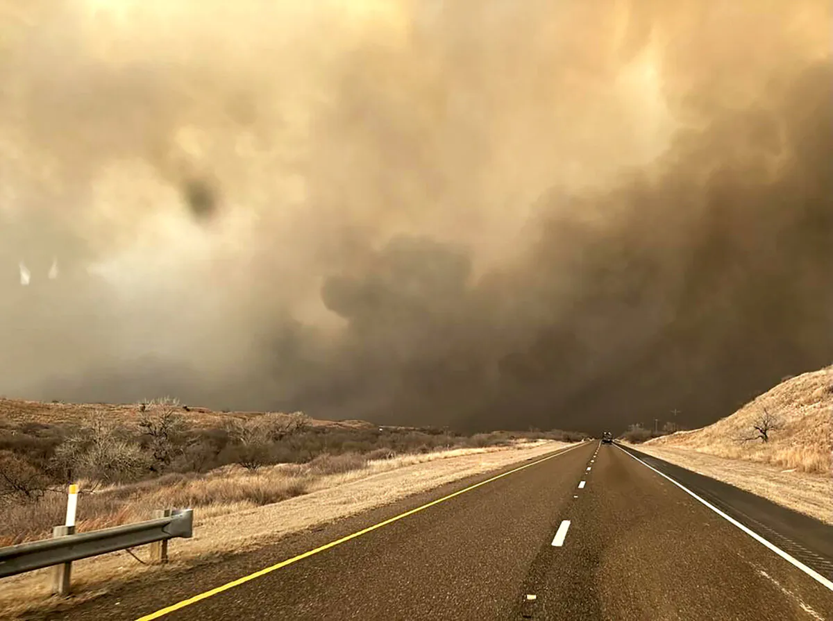 Smoke billows over a road during the Smokehouse Creek Fire in the Texas panhandle on Feb. 27, 2024. (Texas A&M Forest Service via Getty Images)