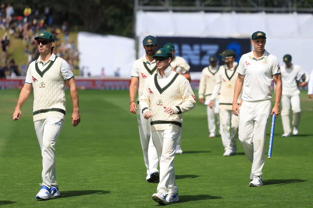 Australia players walk from the field after their win on day four of the first Test cricket match between New Zealand and Australia at the Basin Reserve in Wellington, New Zealand on March 3, 2024. (Marty Melville/AFP via Getty Images)