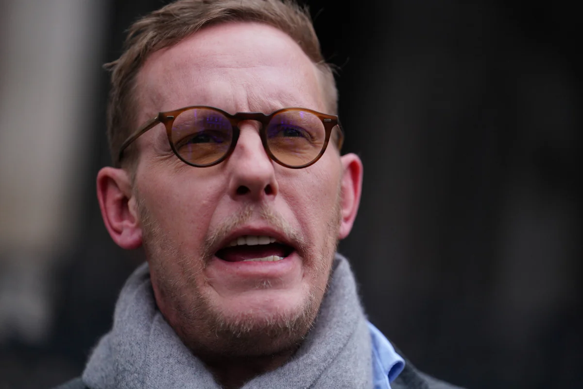 Laurence Fox makes a statement outside the Royal Courts of Justice, central London on Jan. 29, 2024. (Jordan Pettitt/PA Wire)