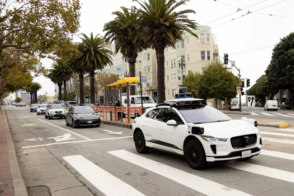A Waymo vehicle on Market Street in San Francisco on Nov. 17, 2023. (Jason Henry/AFP via Getty Images)