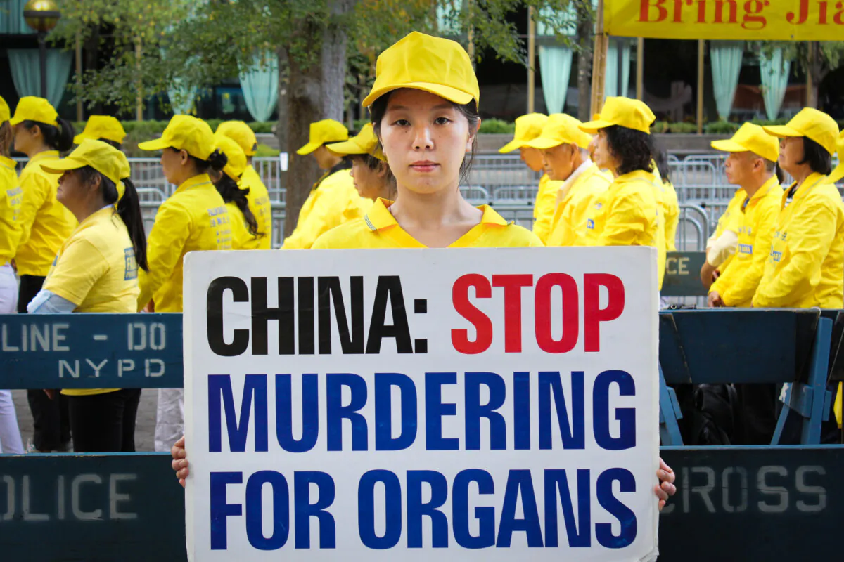 Han Yu, whose father was killed in China because of his belief in Falun Gong, at a rally at the United Nations Plaza in New York City, on Sept. 24, 2019. (Eva Fu/The Epoch Times)