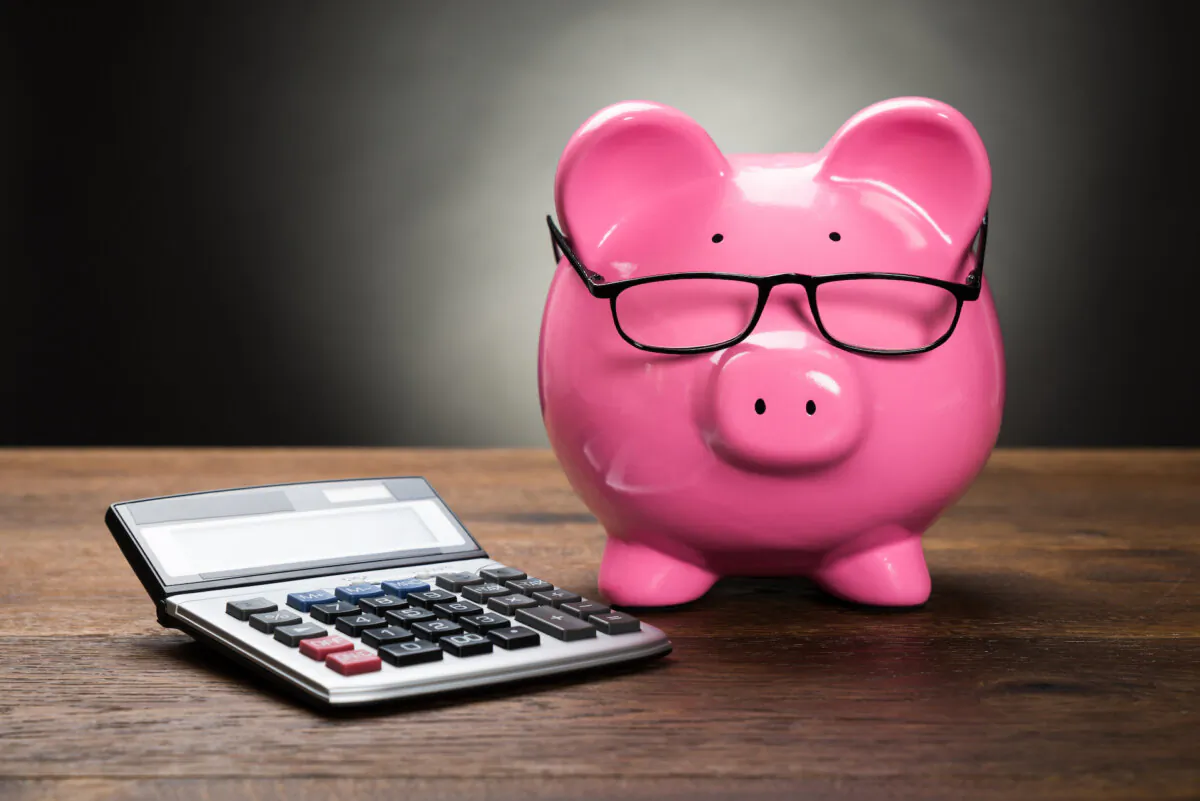Allowing money to build up in a separate account will provide the reserve you need to pay those with an uncertain income even during the slow months. (Andrey_Popov/Shutterstock)
