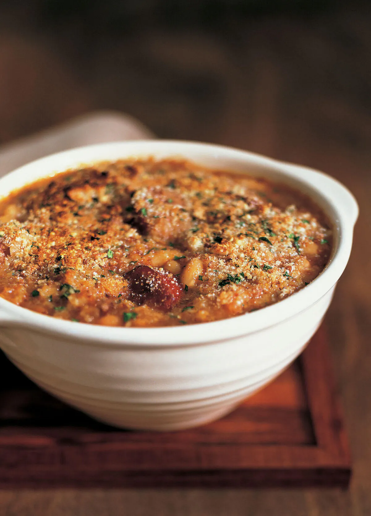 Pre-cooked sausage adds an American touch. (Jonelle Weaver/TNS)