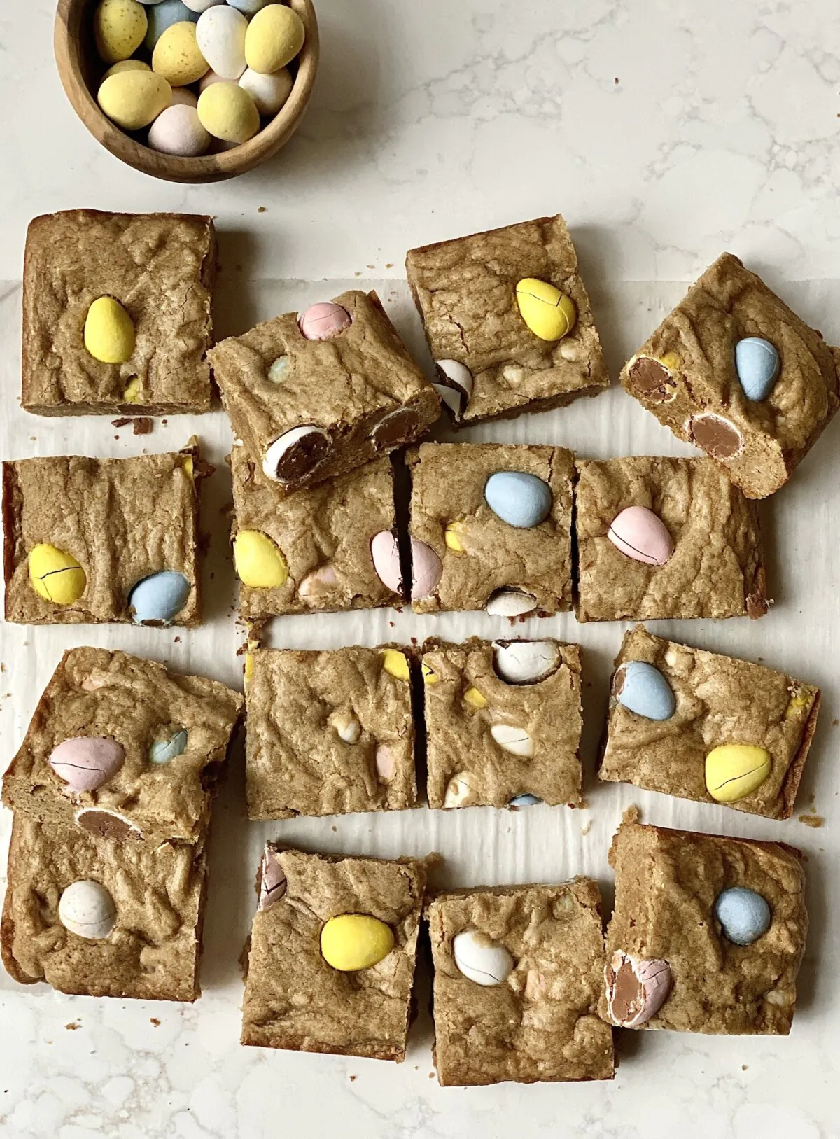 These blondies are studded with pieces of pastel-colored milk chocolate Cadbury Mini Eggs. (Kelli Foster/TNS)