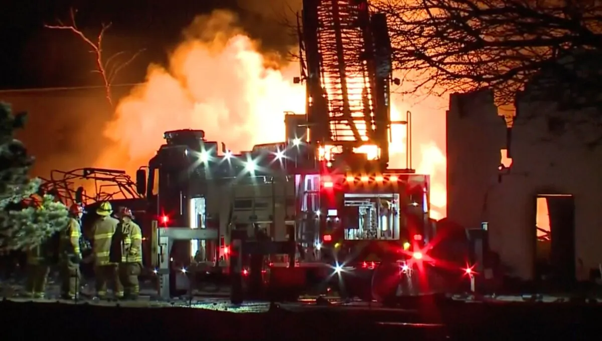 Firefighters battle an industrial fire in the Detroit suburb of Clinton Township on March 4, 2024, in a still from video. (Courtesy of WXYZ via AP)