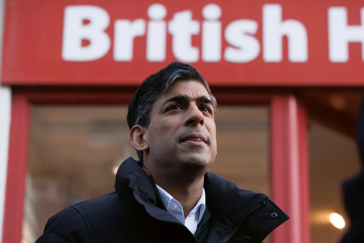 UK Prime Minister Rishi Sunak speaks to members of the public while walking down the high street during a visit in Winchester, England, on Jan. 19, 2024. (Dan Kitwood/Getty Images)