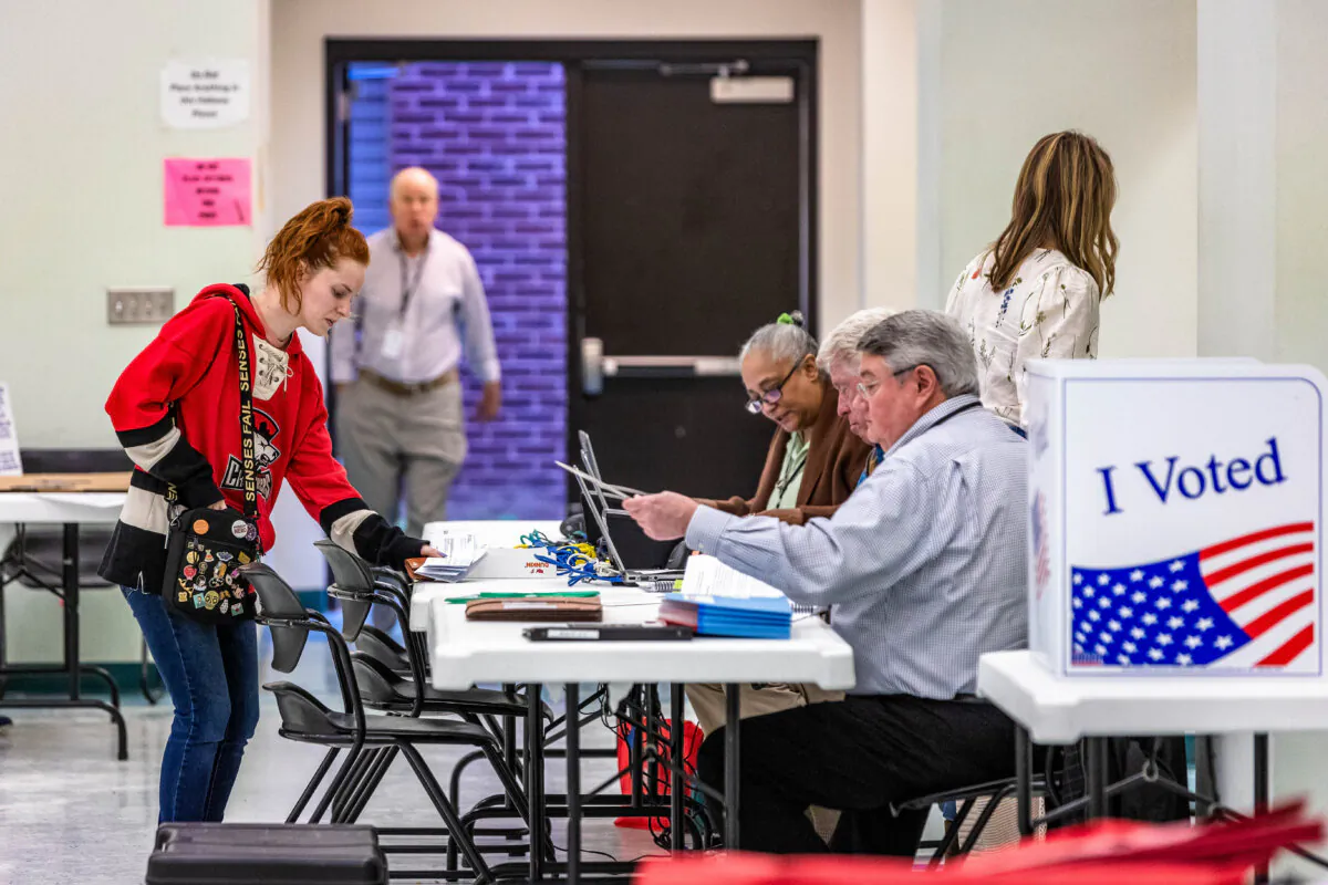 Voters arrive and check in on Super Tuesday at a polling station in Charlotte, N.C., on March 5, 2024. (Grant Baldwin/Getty Images)
