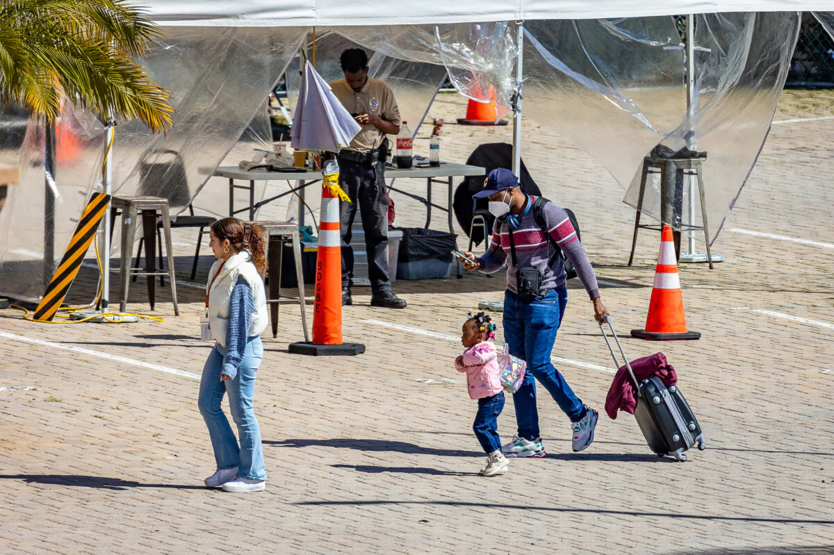Illegal immigrants utilize shelter services provided by nonprofit groups in San Diego, Calif., on Feb. 22, 2024. (John Fredricks/The Epoch Times)