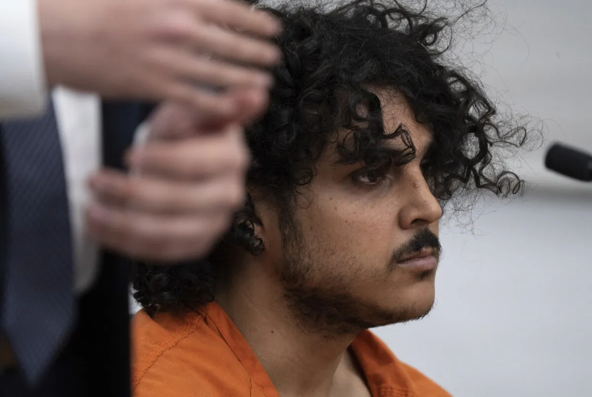 Raad Almansoori listens during a court hearing in Maricopa County Superior Court in Phoenix on Feb. 26, 2024. (Mark Henle, The Arizona Republic via AP)