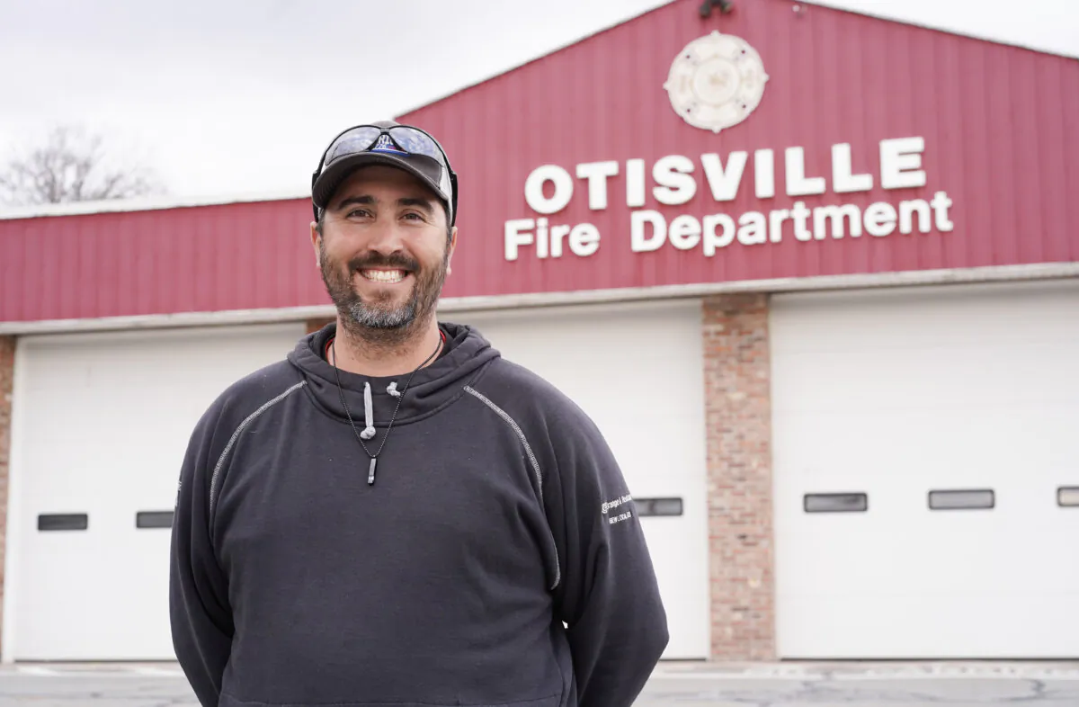 Village trustee Brian Lattimer in front of Otisville Fire Department in Otisville, N.Y., on March 4, 2024. (Cara Ding/The Epoch Times)