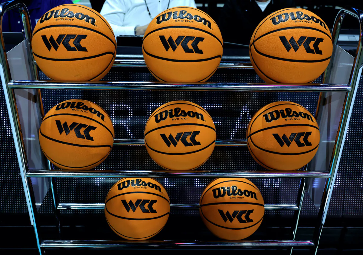 Basketballs with the West Coast Conference logo are shown in a ball rack before a semifinal game of the West Coast Conference basketball tournament at the Orleans Arena in Las Vegas on March 6, 2023. (Ethan Miller/Getty Images)
