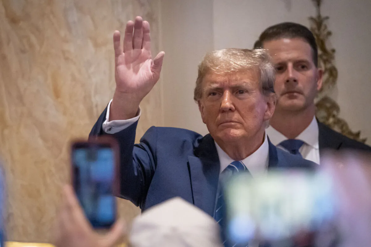 Republican presidential candidate former President Donald J. Trump greets his supporters after speaking on Super Tuesday at Mar-a-Lago Club in Palm Beach, Fla., on March 5, 2024. (Madalina Vasiliu/The Epoch Times)