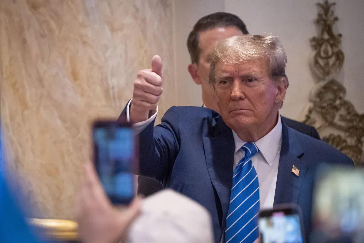 Republican presidential candidate former President Donald J. Trump greets his supporters after speaking on Super Tuesday at Mar-a-Lago Club in Palm Beach, Fla., on March 5, 2024. (Madalina Vasiliu/The Epoch Times)