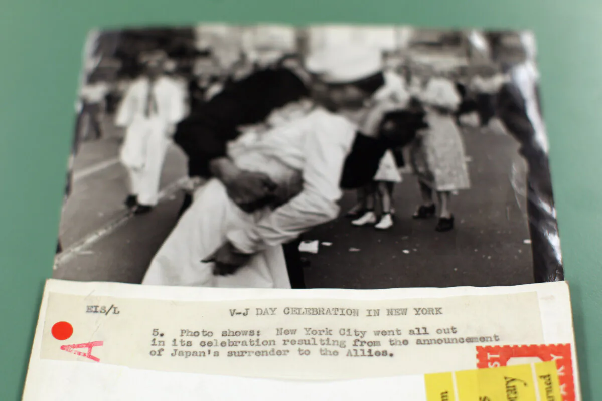 A black and white print of a sailor and a nurse kissing in Times Square on VJ Day is laid out from the vast collection of historic photographs stored in the Hulton Archive in London, England, on May 13, 2011. (Oli Scarff/Getty Images)
