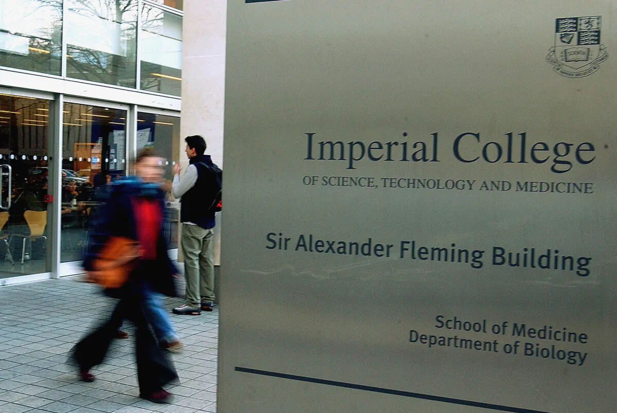 A student walks past the medical department of Imperial College London in Kensington, London, on Jan. 22, 2003. (John Li/Getty Images)
