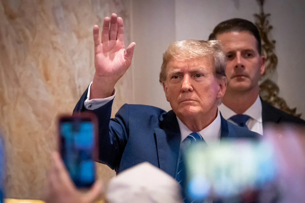 Republican presidential candidate former President Donald J. Trump greets his supporters after speaking on Super Tuesday at Mar-a-Lago Club in Palm Beach, Fla., on March 5, 2024. (Madalina Vasiliu/The Epoch Times)