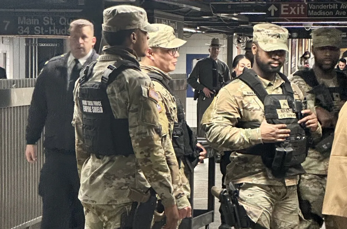 National Guardsman patrol Grand Central Station and subway on the evening of March 6, 2024. (Juliette Fairley/The Epoch Times)