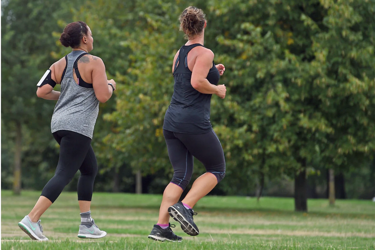 File photo of people jogging through Hyde Park in London on Aug. 22, 2018. (PA Wire/PA Images)