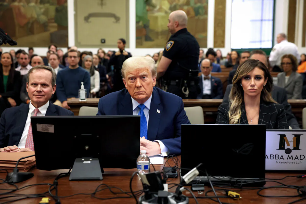 Former President Donald Trump in the courtroom with attorneys Christopher Kise (L) and Alina Habba (R) during his civil fraud trial at New York State Supreme Court in New York on Nov. 6, 2023. (Brendan McDermid-Pool/Getty Images)