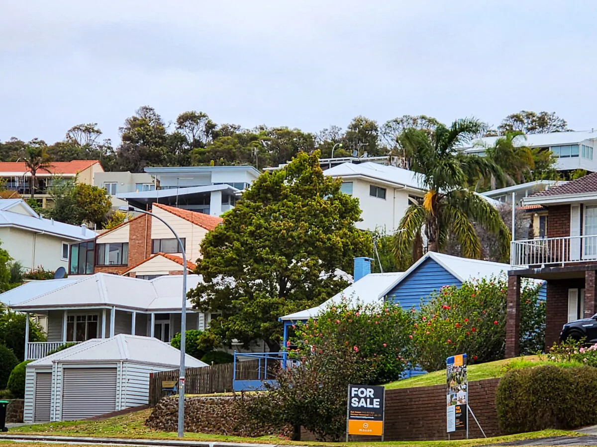 A for sale sign is seen in front of houses with a view in a wealthy, beachside suburb in Albany, Western Australia, on March 2, 2024. (Susan Mortimer/The Epoch Times)