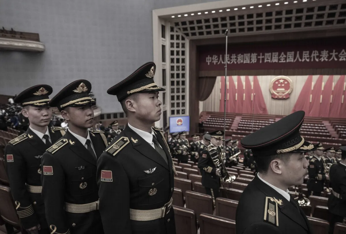 Members from the People's Liberation Army Band leave after the opening of the NPC, or National People's Congress, at the Great Hall of the People on in Beijing on March 5, 2024. (Kevin Frayer/Getty Images)