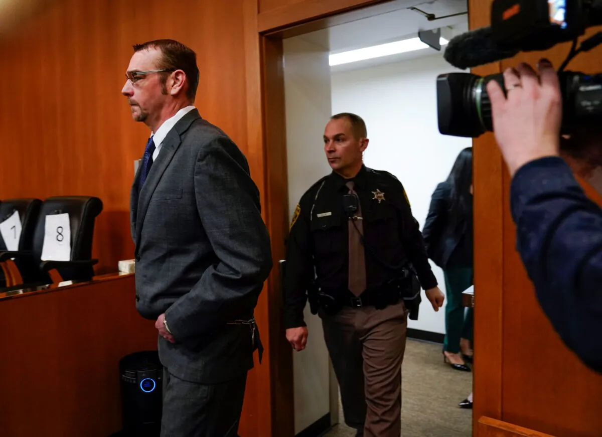 James Crumbley enters the Oakland County courtroom of Cheryl Matthews before his trial in Pontiac, Mich., on March. 7, 2024. (Mandi Wright/Pool/Detroit Free Press via AP)