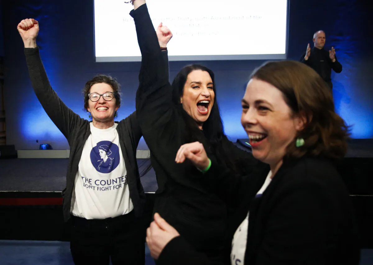 People from the human rights and advocacy group The Countess celebrated at Dublin Castle as the result is announced in the first of the twin referenda to change the Constitution on family and care, in Dublin on March 9, 2024. (Damien Storan/PA)