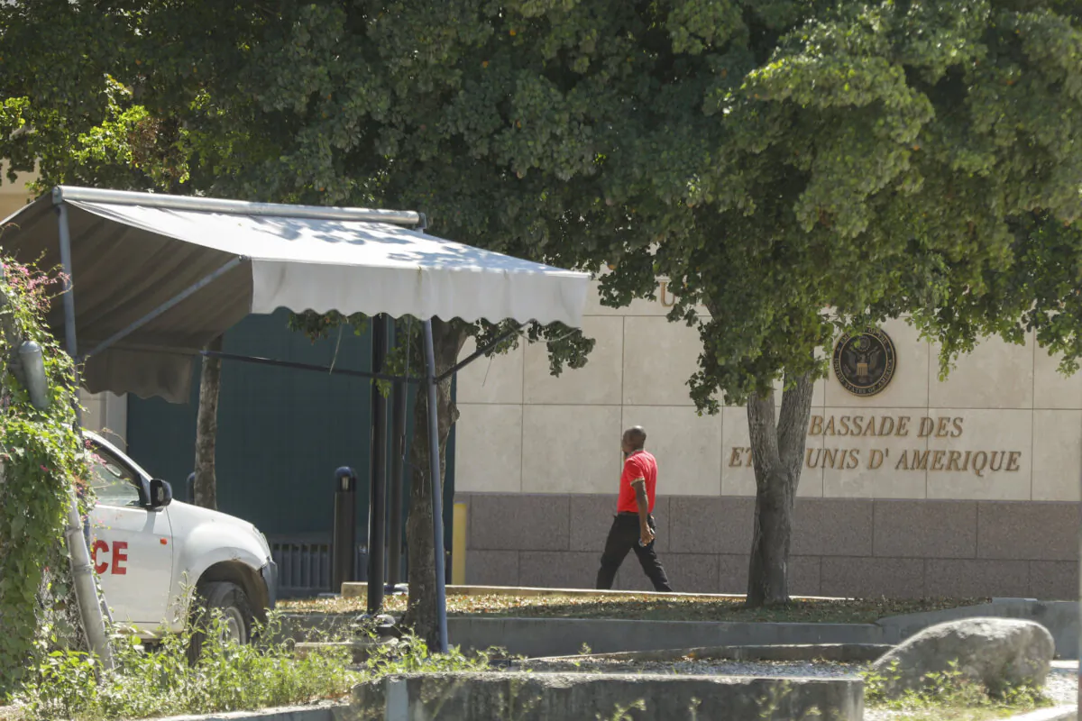 A man enters the U.S. embassy in Port-au-Prince, Haiti, on March 10, 2024. (Odelyn Joseph/AP Photo)