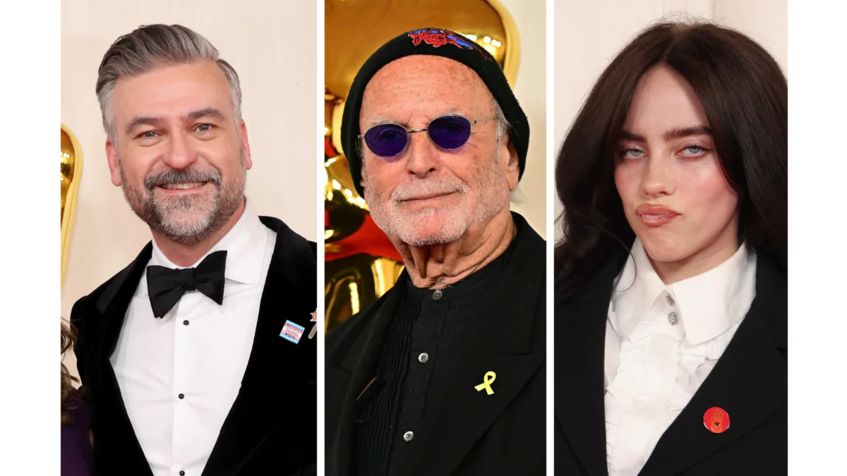 (L-R) Canadian Film director Troy Quane, Israeli-American film producer Avi Arad, and U.S. singer-songwriter Billie Eilish attends the 96th Annual Academy Awards at the Dolby Theatre in Hollywood, Calif., on March 10, 2024. (Frederic J. Brown/AFP via Getty Images)