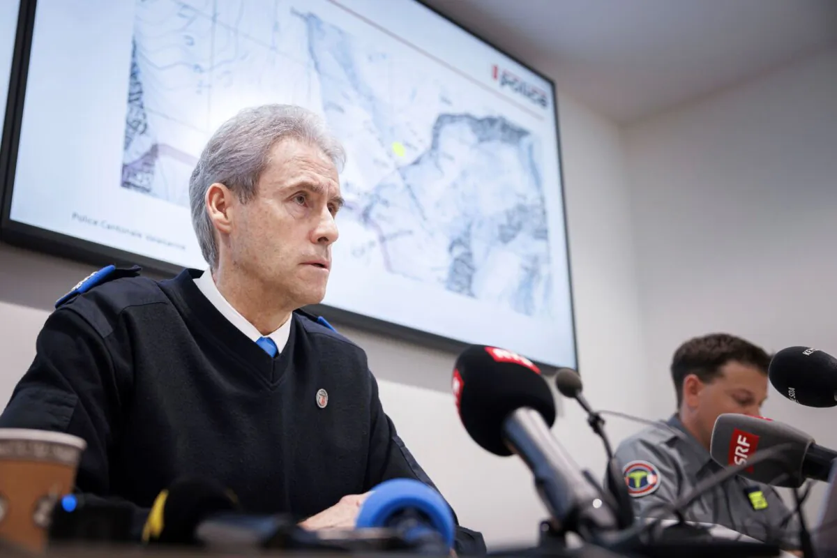 Commandant of the Valais Cantonal Police Christian Varone speaks during a press conference, in Sion, Switzerland, on March 11, 2024. (Valentin Flauraud/Keystone via AP)