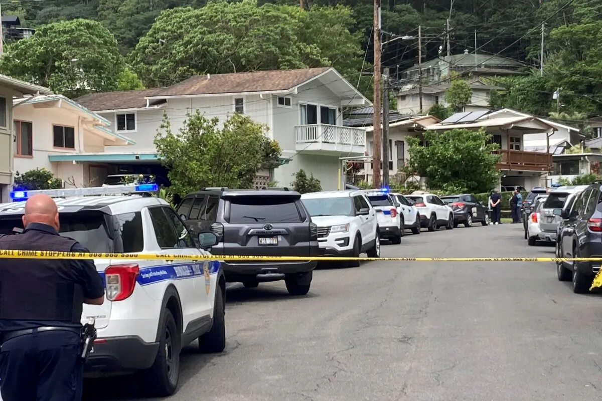 Honolulu police investigate the killings of multiple people at a home in Honolulu's Manoa neighborhood, on March 10, 2024. (Craig T. Kojima/Honolulu Star-Advertiser via AP)