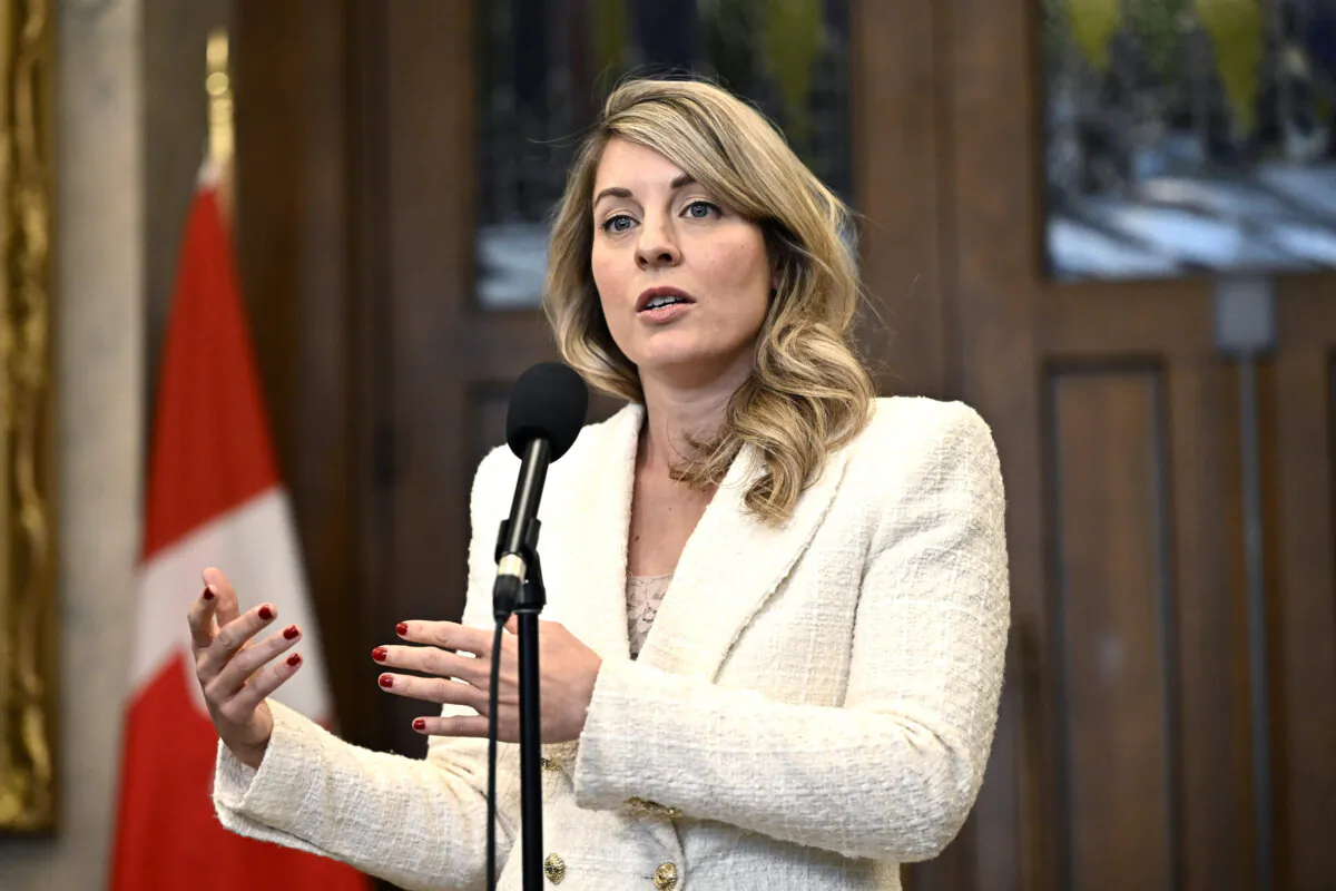 Minister of Foreign Affairs Melanie Joly  responds to questions from reporters in the Foyer of the House of Commons on Parliament Hill after Question Period, in Ottawa on Feb. 29, 2024. (The Canadian Press/Justin Tang)