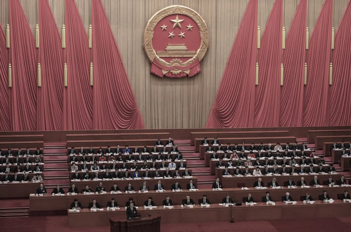 The opening of China's rubber-stamp legislature, the National People's Congress, at the Great Hall of the People in Beijing on March 5, 2024. (Kevin Frayer/Getty Images)