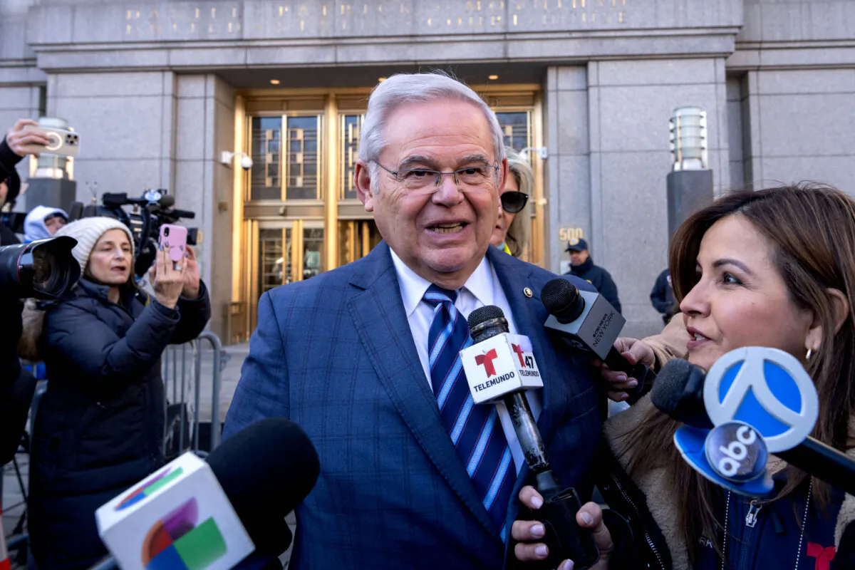Sen. Bob Menendez (D-N.J.)(C) speaks to members of the media outside the Manhattan Federal Court, in New York City following his arraignment on March 11, 2024. (Adam Gray/AFP via Getty Images)
