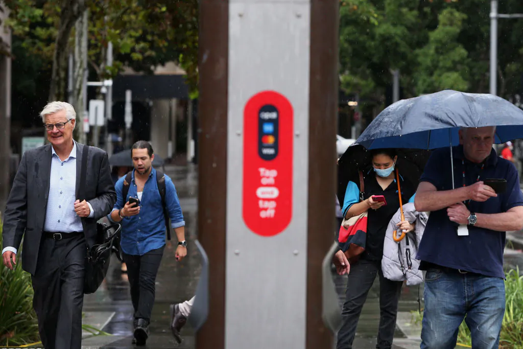 People arrive at the Circular Quay tram in Sydney, Australia on Feb. 25, 2022. (Lisa Maree Williams/Getty Images)